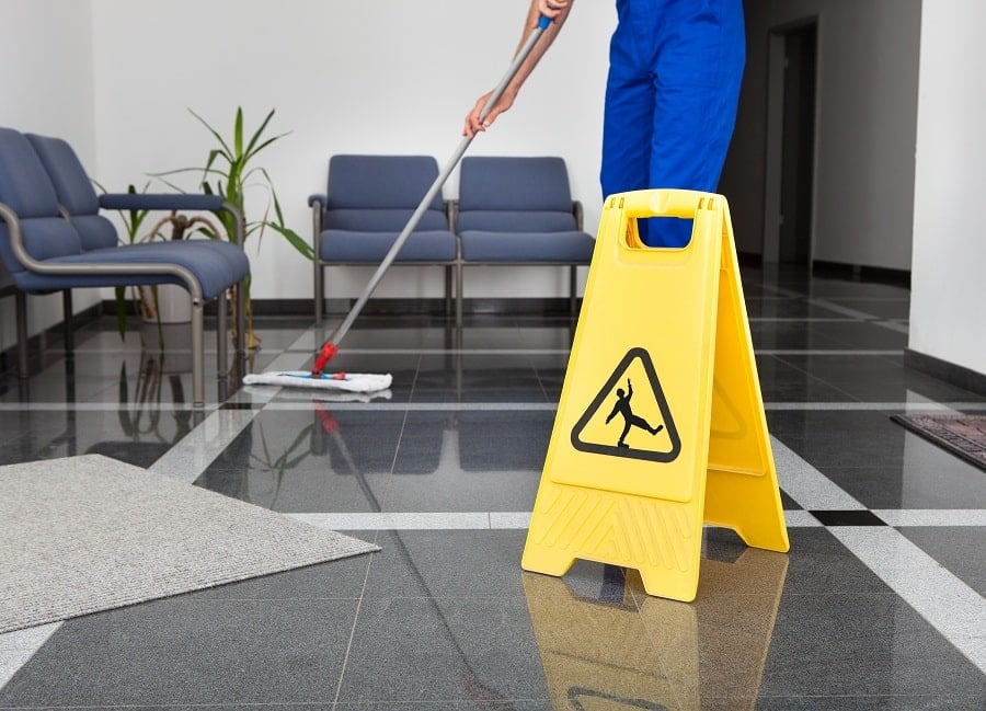Professional reception area cleaning services in Boston - sanitized front desk and welcoming waiting area maintenance